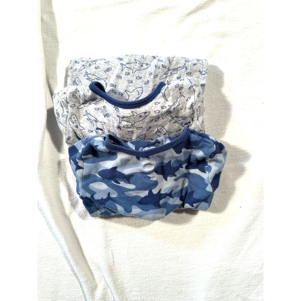 Set of two 1-piece pajamas themed around shark in 2T
